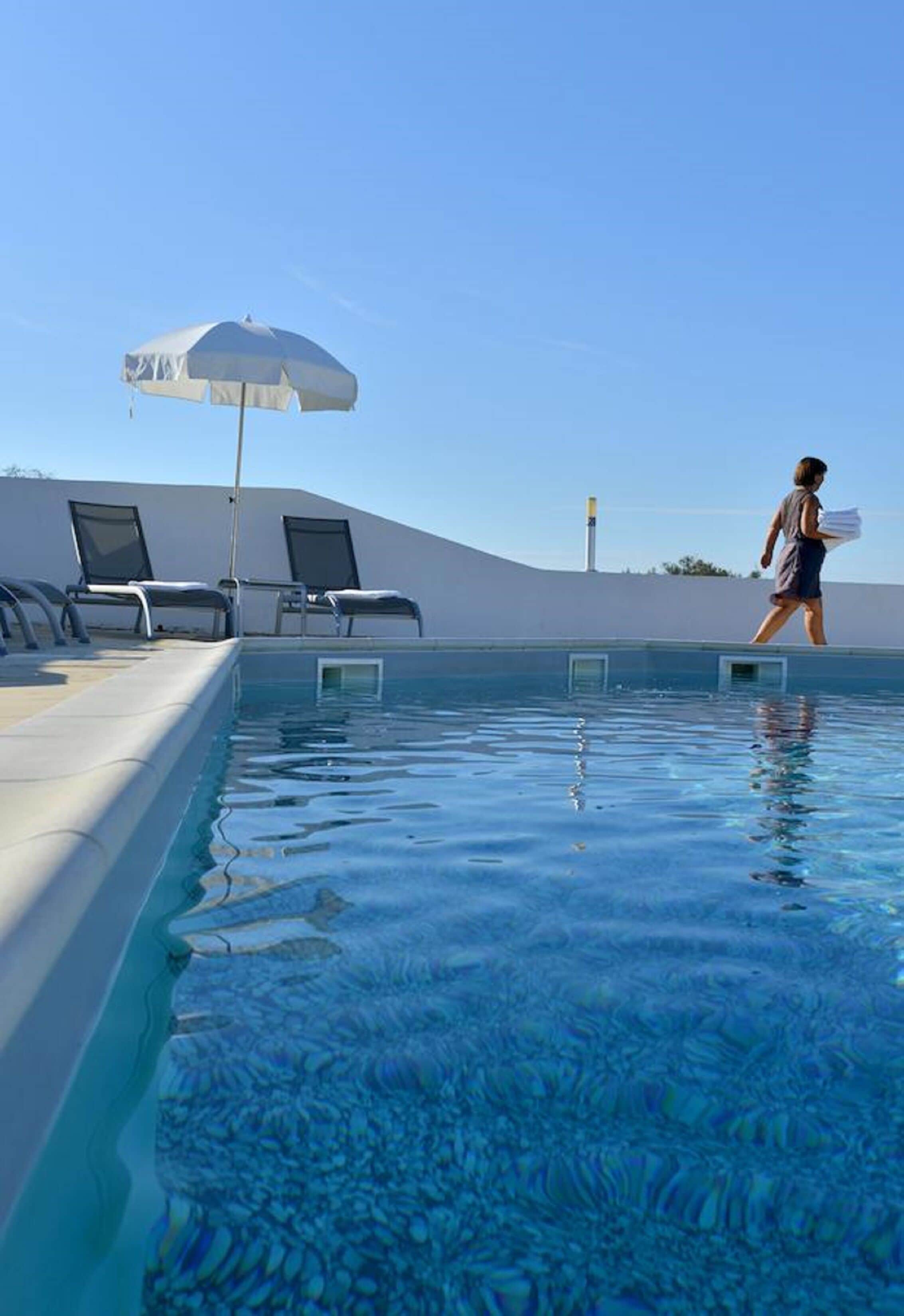 Outdoor pool, sun loungers