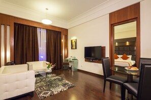 Suite | Coin séjour | Télévision à écran plat, lecteur de DVD, films à la carte