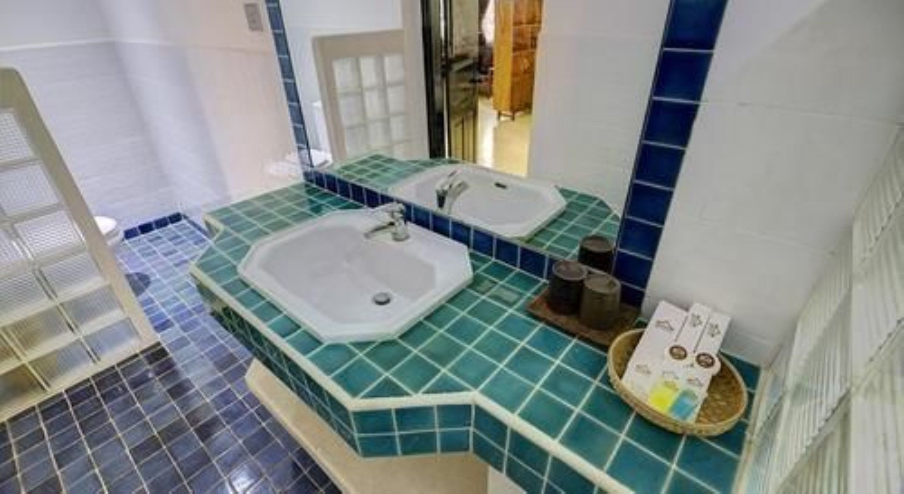 elegant suite room | bathroom | free toiletries, hair dryer, bathrobes, slippers