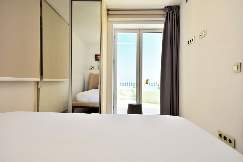 Luxe penthouse, 2 slaapkamers, uitzicht op oceaan | 2 slaapkamers, luxe beddengoed, een kluis op de kamer