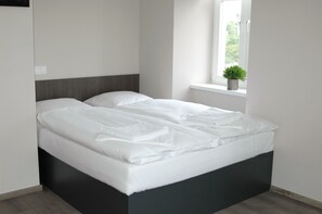 Cortinas blackout, wifi gratis y ropa de cama 