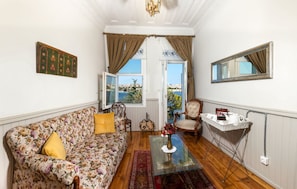 Suite, Balcony | Living area | LCD TV