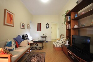 Standard Apartment, 2 Bedrooms, Kitchen, Beachside | Living area | Flat-screen TV, DVD player