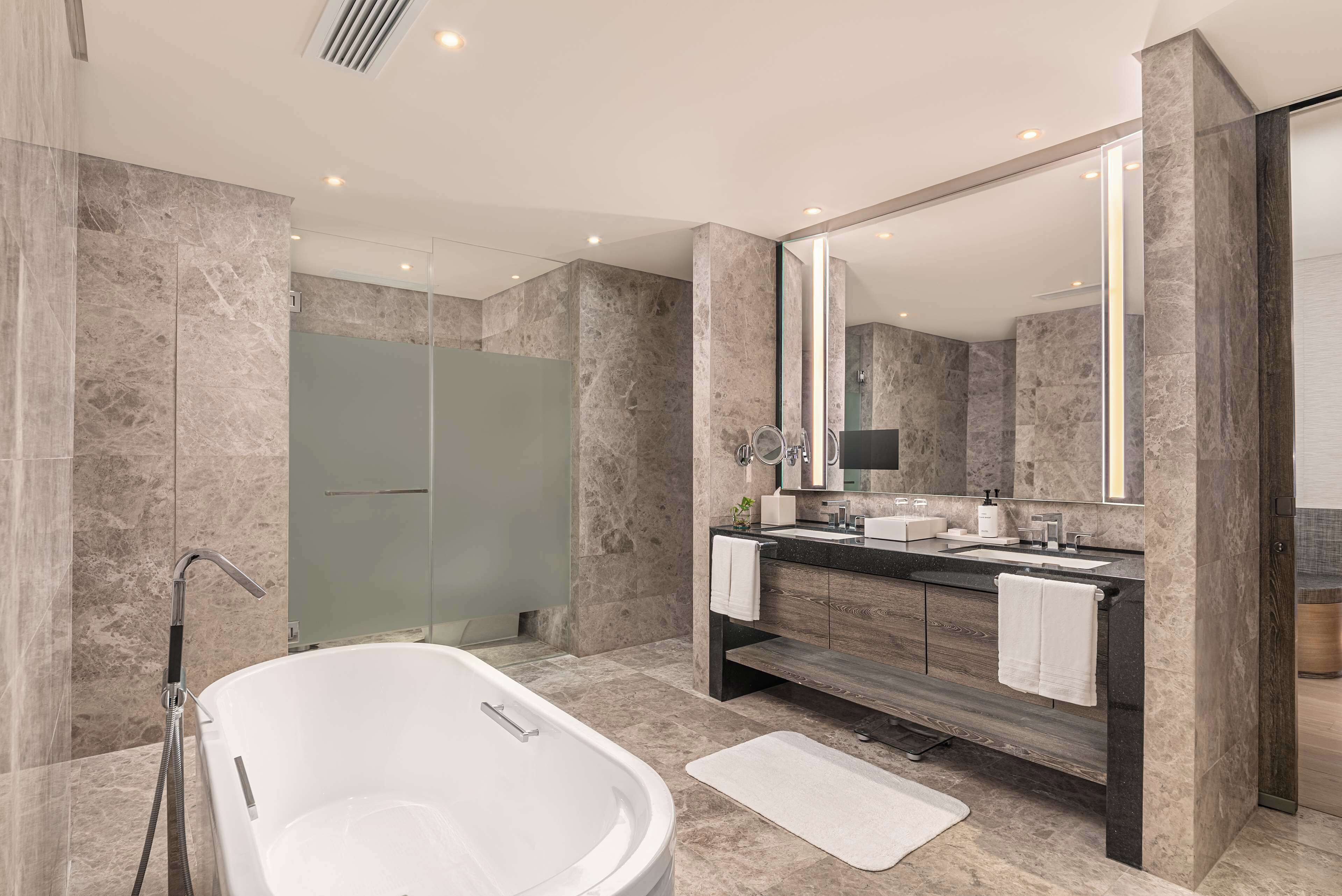 premier one bedroom suite - lounge access | bathroom | shower, rainfall showerhead, free toiletries, bathrobes