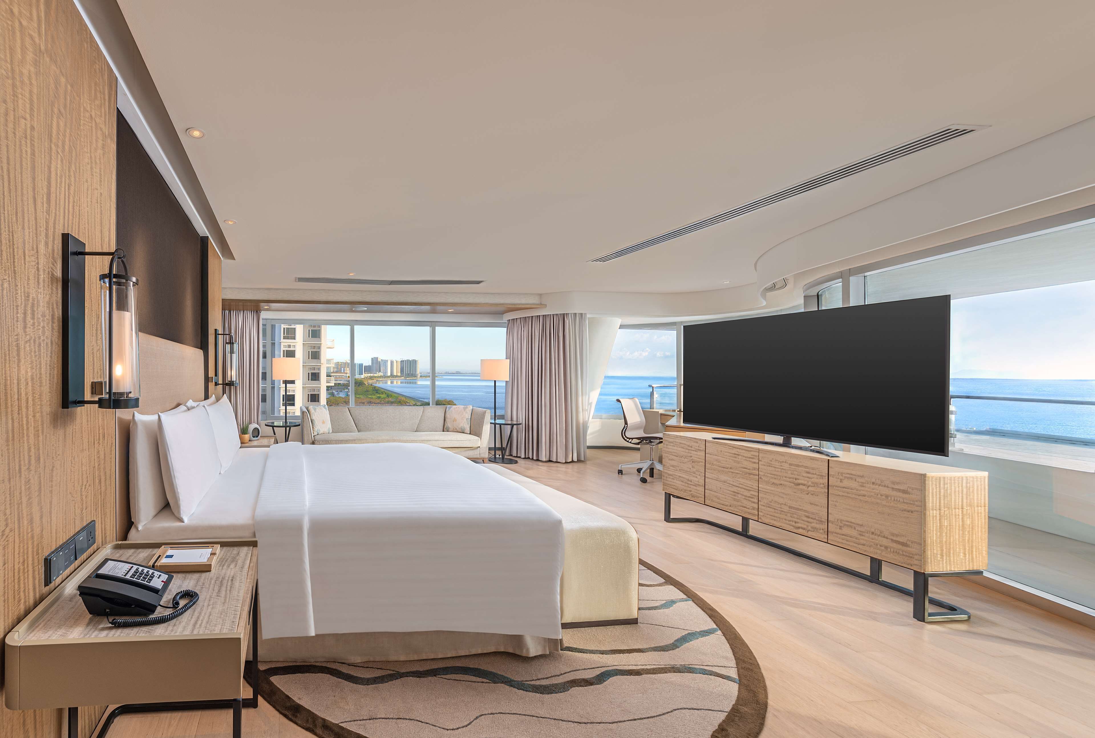 bay view two bedroom ambassador suite-balcony | living area | 42-inch lcd tv with premium tv channels, tv, pay films