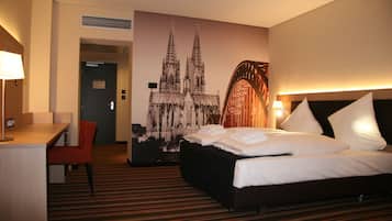 Triple Room (with shower) | Minibar, in-room safe, desk, soundproofing