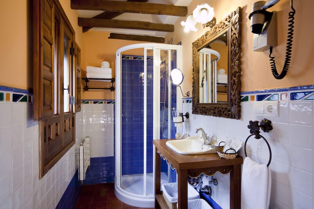 superior twin room | bathroom | shower, free toiletries, hair dryer, towels