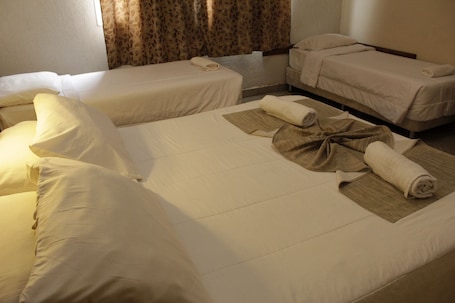 Family Quadruple Room | Desk, free WiFi, bed sheets