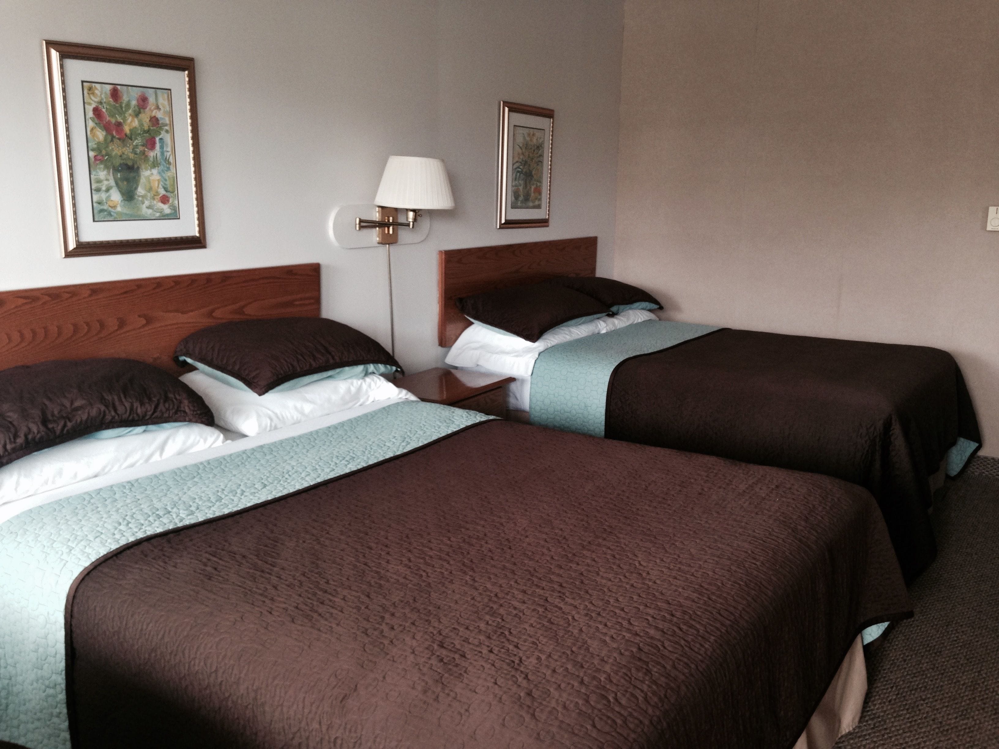 Standard Room (1 Queen and 1 Double Bed)