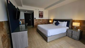 Deluxe Single Room | Premium bedding, in-room safe, desk, iron/ironing board