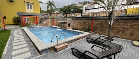 Outdoor pool, sun loungers