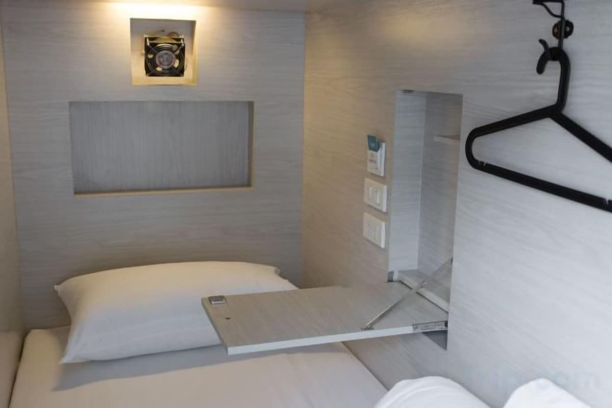 Roba de llit d'alta qualitat i caixa forta a l'habitació