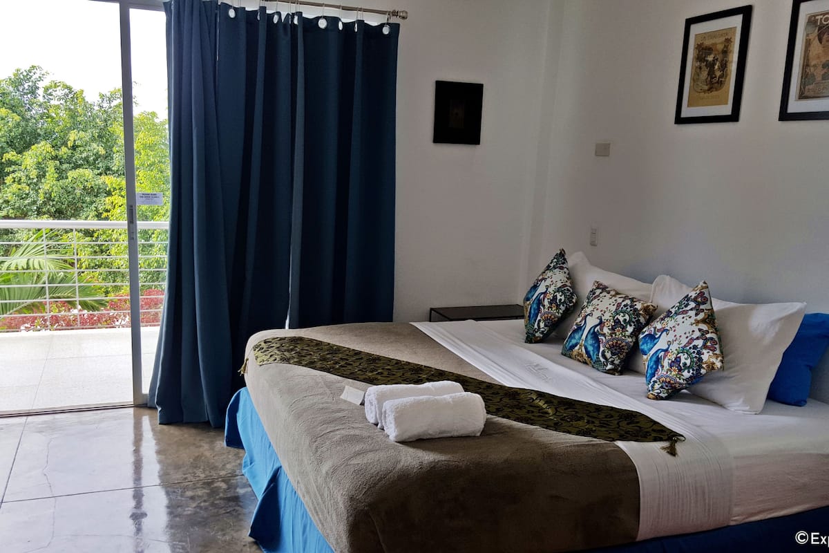 room, 1 king bed | premium bedding, in-room safe, desk, blackout curtains