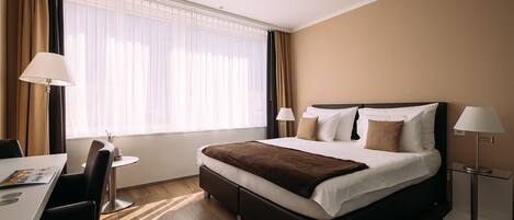 Modern Double Room | Hypo-allergenic bedding, in-room safe, desk, laptop workspace