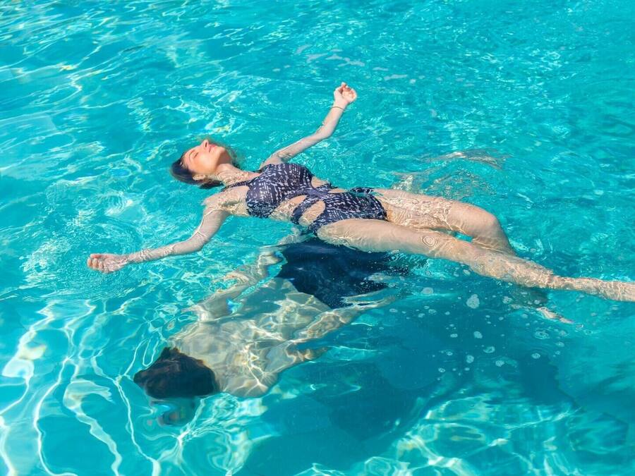 Seasonal outdoor pool, open 10:00 AM to 8:00 PM, pool umbrellas