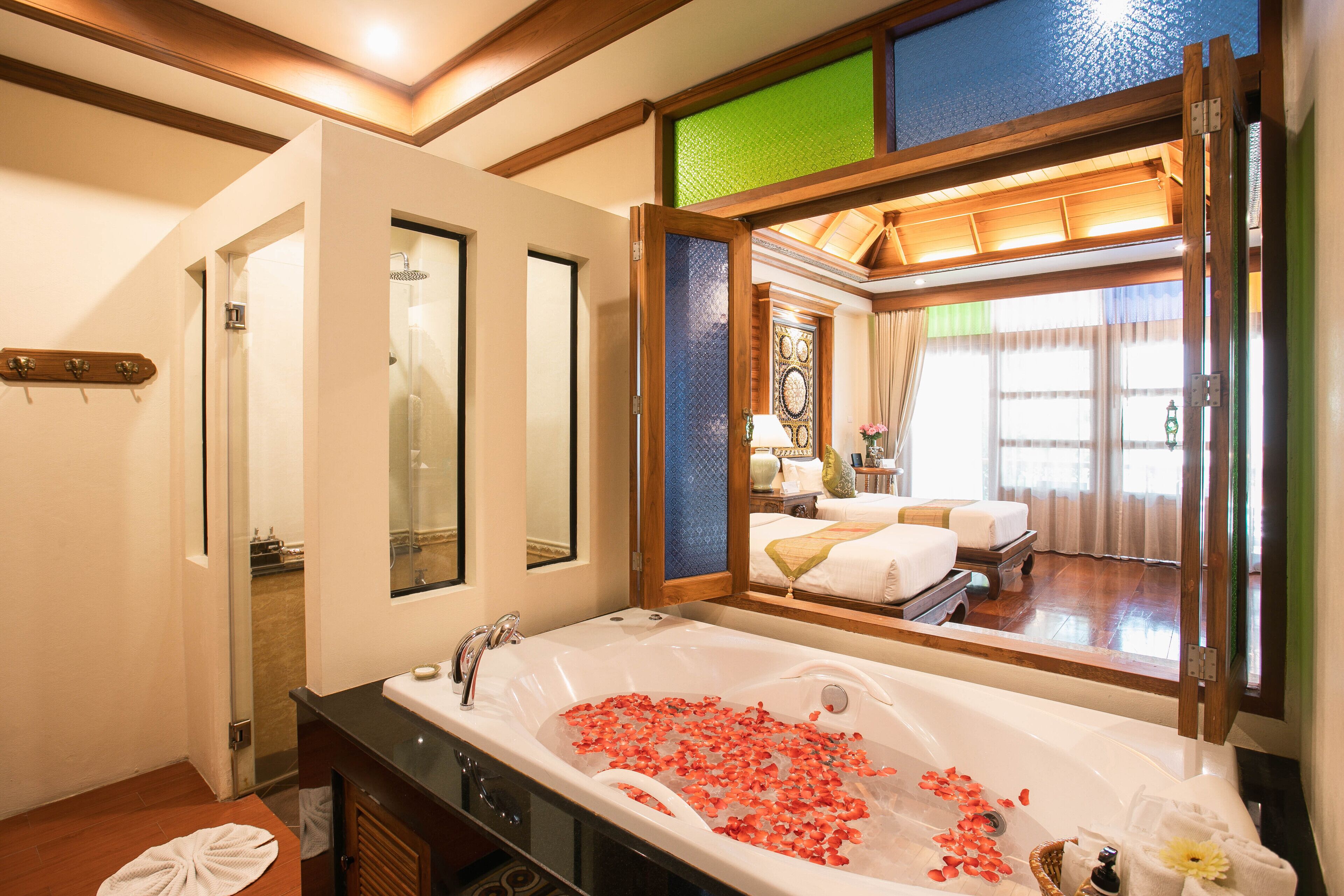 luxury twin bed with spa bath | in-room safe, desk, blackout curtains, soundproofing