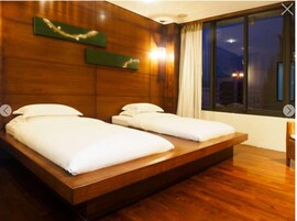 Deluxe Twin Room, 2 Twin Beds | Minibar, in-room safe, blackout drapes, free WiFi