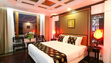 Habitación Deluxe (with Church View) | Ropa de cama de alta calidad y minibar