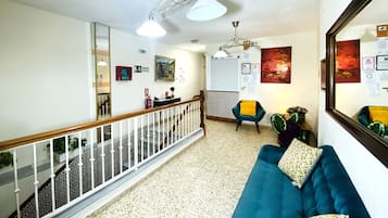 Tweepersoonskamer, 1 tweepersoonsbed | Woonruimte | Flatscreentelevisie