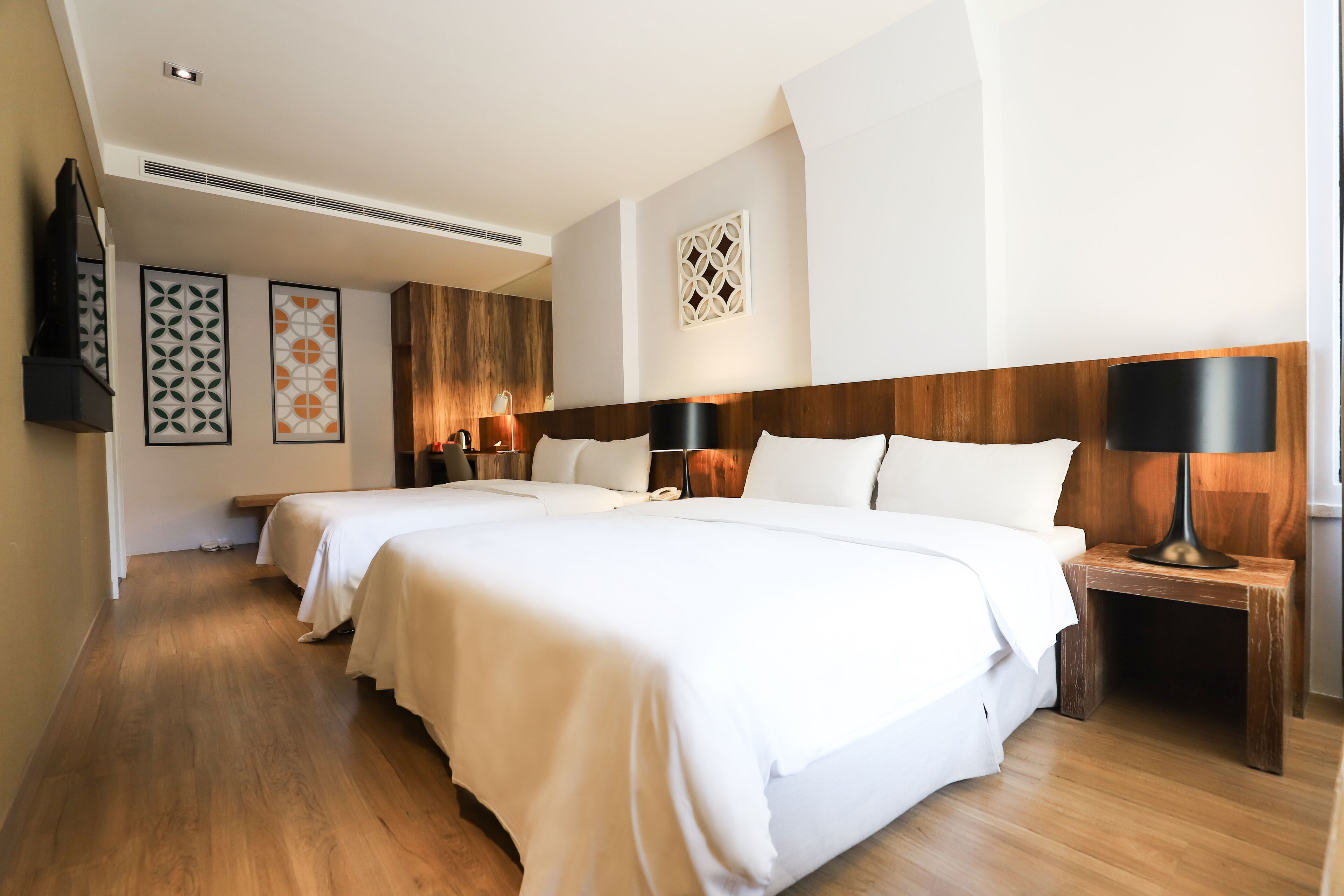 deluxe quadruple room | 1 bedroom, desk, laptop workspace, blackout curtains