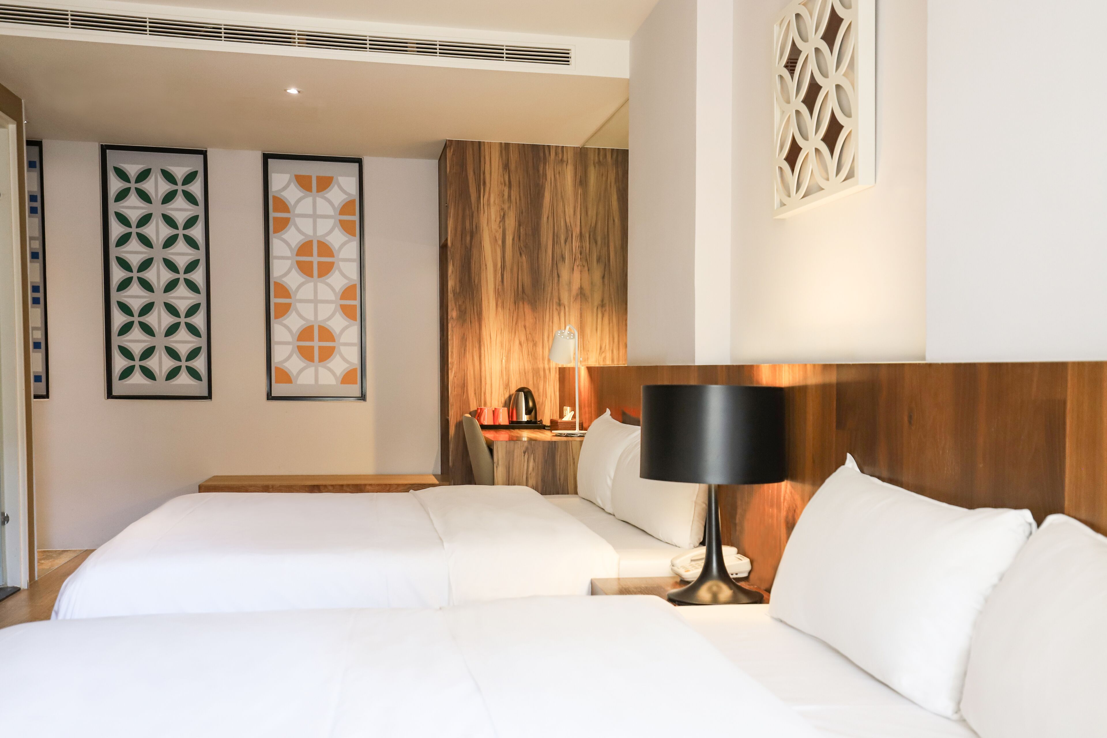 deluxe quadruple room | 1 bedroom, desk, laptop workspace, blackout curtains