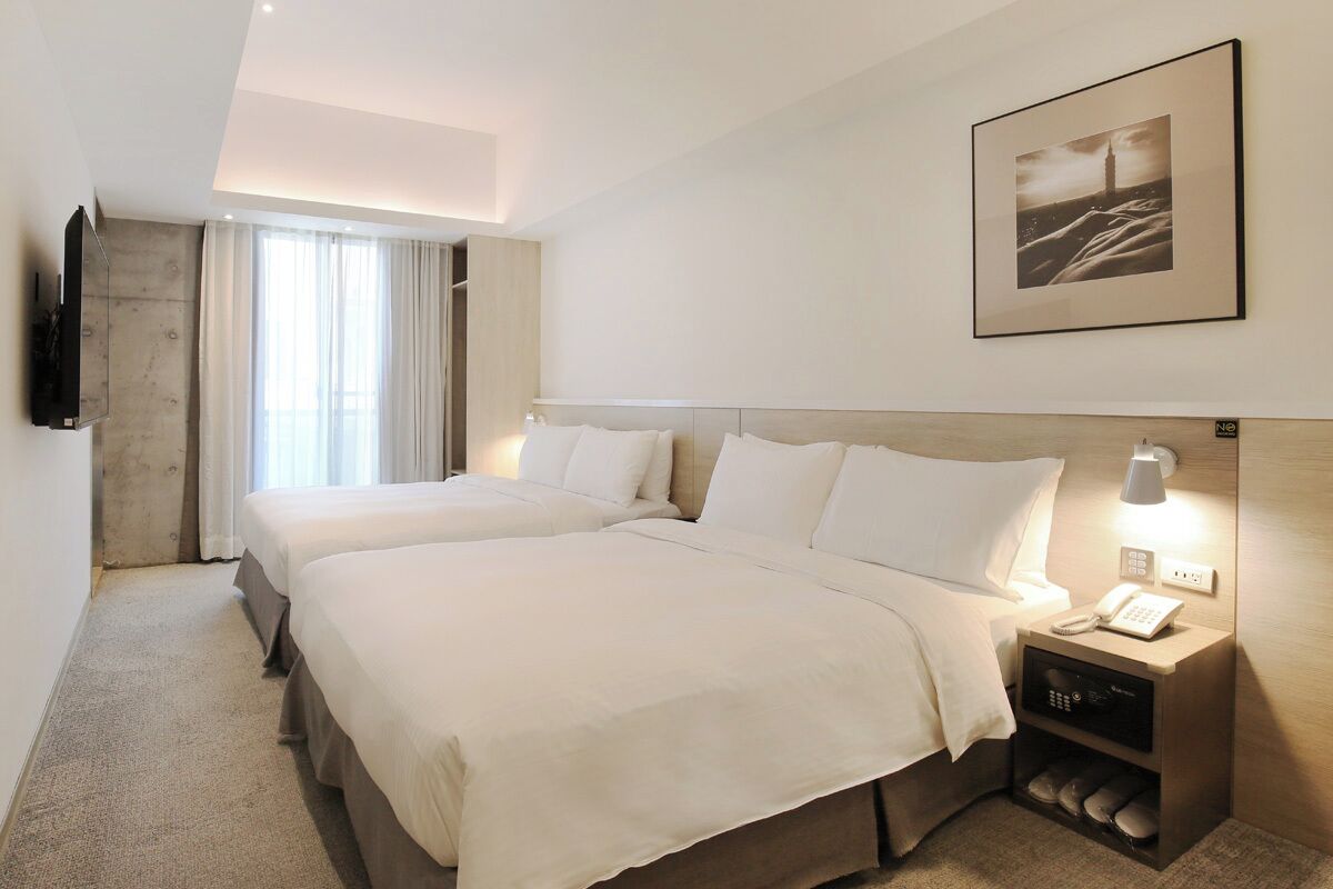 Family Room | Down comforters, in-room safe, desk, blackout drapes