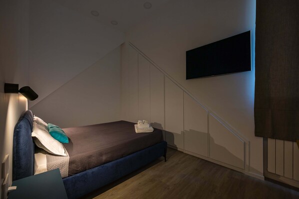 アパートメント (1 Bedroom) | 1 室のベッドルーム、ノートパソコン用作業スペース、ベッドシーツ