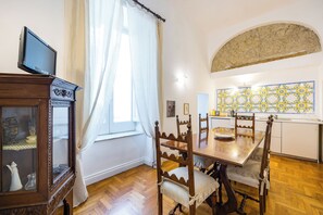 Apartment (2 Bedrooms) | Living area | 32-inch Smart TV with cable channels