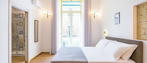 Departamento, varias camas (1 Bedroom) | 1 habitación y ropa de cama