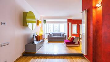 Apartment (2 Bedrooms) | Living area | 32-inch TV with cable channels