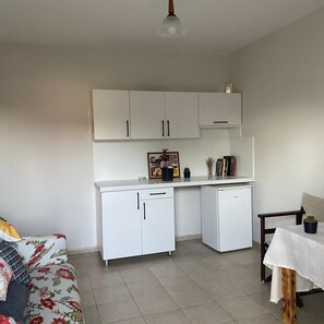 Habitación cuádruple familiar, vista a la ciudad | Wifi gratis