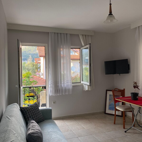 Habitación cuádruple familiar, vista a la ciudad | Wifi gratis