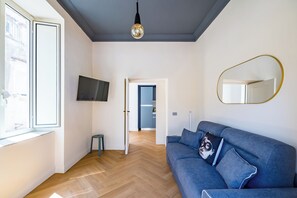 Apartment (2 Bedrooms) | Living area | 32-inch Smart TV with cable channels - Mood Terrace Toledo at Spanish Quarters (Naples)