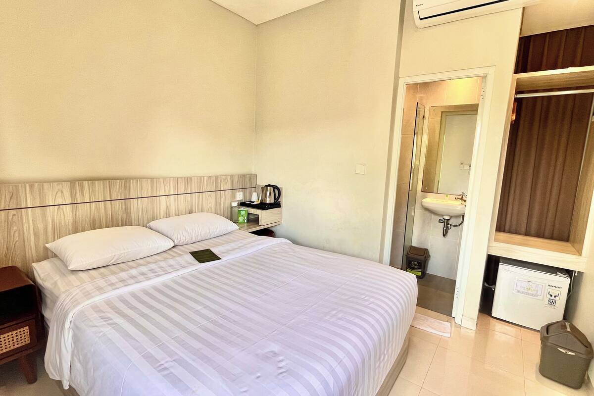Standard Double Room, Courtyard View | In-room safe, desk, laptop workspace, iron/ironing board