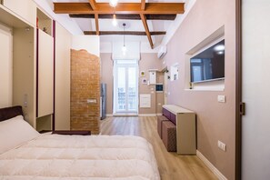 Studio (0 Bedroom) | Laptop workspace, bed sheets