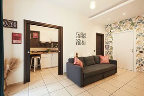 Apartment (1 Bedroom) | Living area | TV