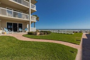 Terrace/patio - Beachfront Comfort w/ Pool, Patio & Steps to Flagler Avenue (New Smyrna Beach)