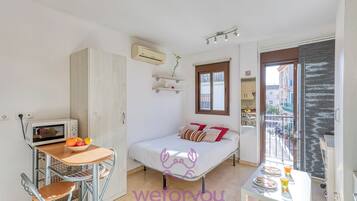 Studio Confort, balcon, vue ville | Bureau, Wi-Fi gratuit