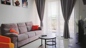 Appart'hôtel, 3 chambres, balcon, vue ville | Salle de séjour