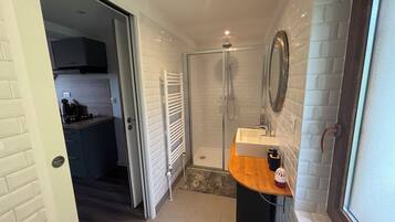 Shower, towels, toilet paper