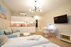 Appartement, balkon | Een strijkplank/strijkijzer, gratis wifi