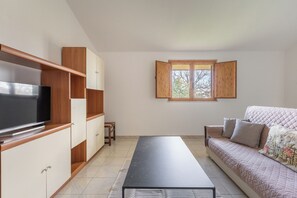 Appartement Confort, 2 chambres, vue jardin | Coin séjour