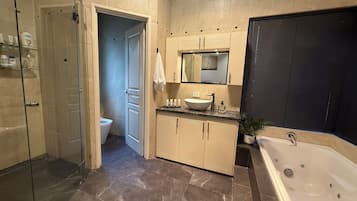 Jetted bath, towels, soap, toilet paper