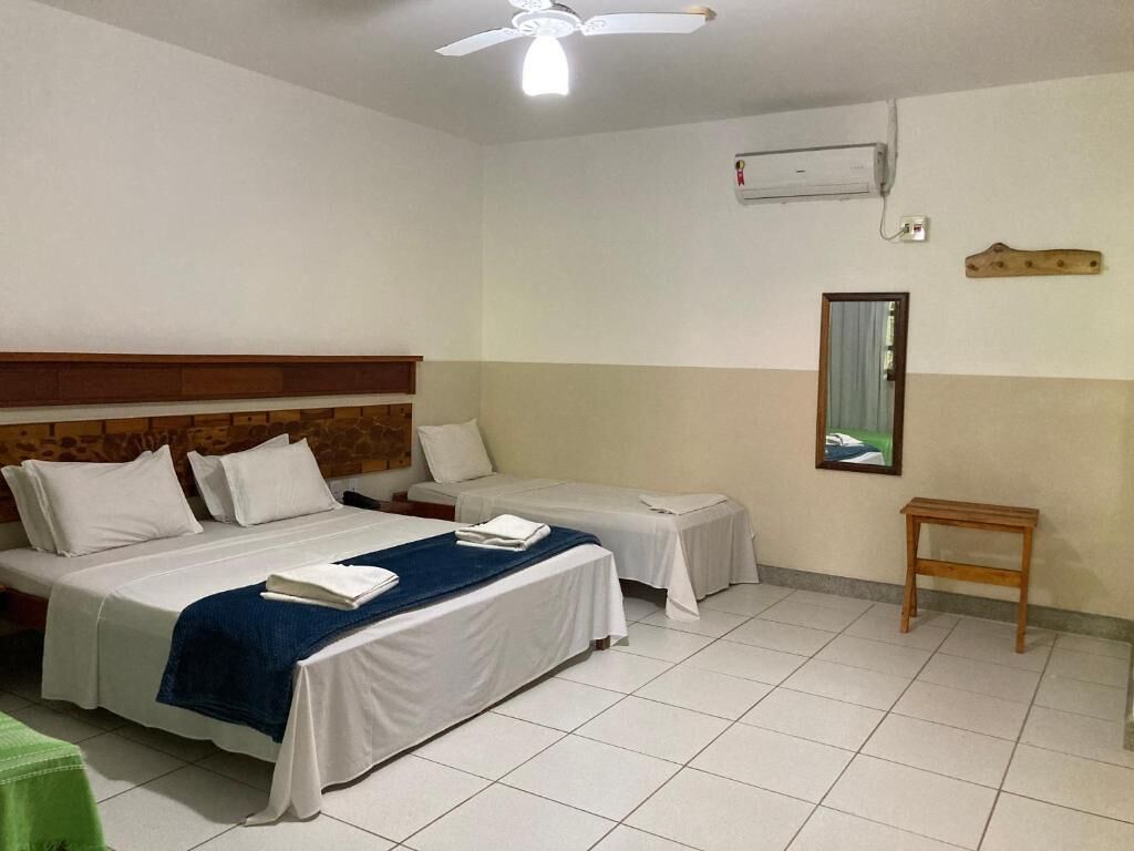 Family Quadruple Room, Garden View | Minibar, laptop workspace, blackout drapes, free WiFi