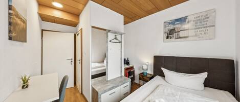 Desk, travel crib, free WiFi, bed sheets
