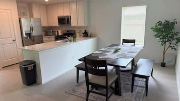 House (4 Bedrooms) | Private kitchen | Fridge, microwave, oven, stovetop
