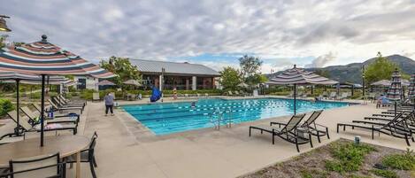 Outdoor pool, pool umbrellas, sun loungers