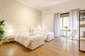 2 bedrooms, iron/ironing board, travel cot