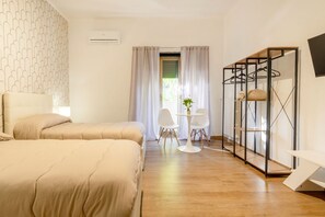 2 bedrooms, iron/ironing board, travel crib
