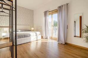 2 bedrooms, iron/ironing board, travel crib